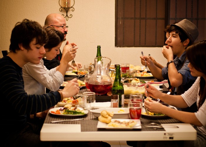 Neighborhood gathering around a table
